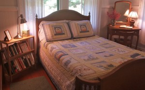 Waipio Wayside, Moon Room, Bed nightstand with mirror and small bookshelf
